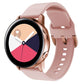 Pink silicone watch band with metal buckle and perforated strap holes