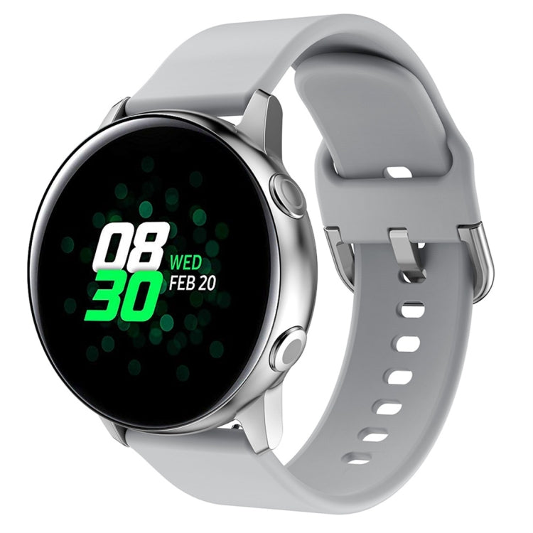Light gray silicone watch band with metal buckle and perforated strap holes