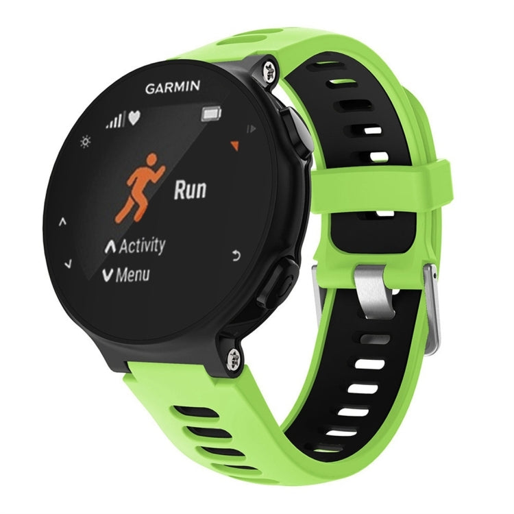 Green silicone smartwatch band with perforated strap and black watch face