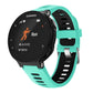 Teal silicone smartwatch band with perforated holes and black watch face
