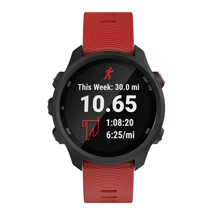 Silicone watch band for Garmin Forerunner 245 in red, shown with round smartwatch face