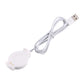 White watch charging cradle with USB-A cable and bundled connector leads