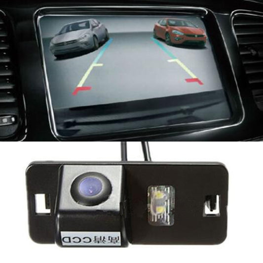 Rear view parking camera display with colored parking guide lines on a screen