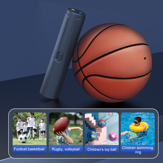 Portable electric air pump resting beside an orange basketball