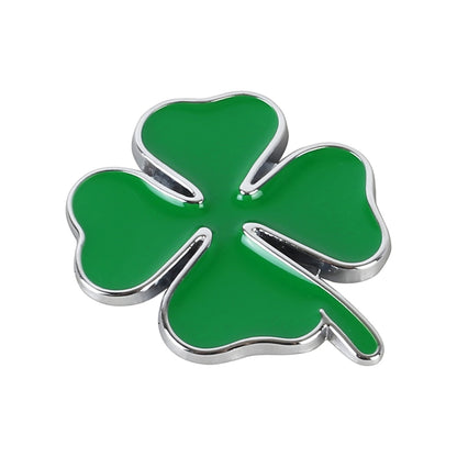 Four-leaf clover metal-look badge sticker with green enamel and chrome outline
