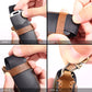 Hands installing a leather key fob cover with metal clasp and stitching