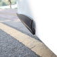 Installed dark bumper strip on a car corner, sleek low-profile fit