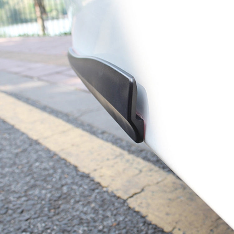 Installed dark bumper strip on a car corner, sleek low-profile fit