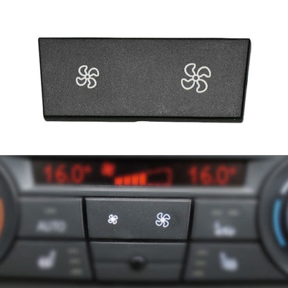 Car air conditioner air volume switch button, black panel with two fan icons