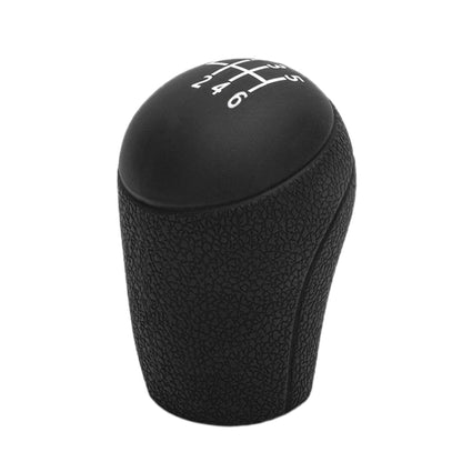 Black silicone 6-speed shift knob cover with textured grip and gear-position imprint