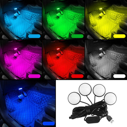 RGB LED car foot atmosphere lights with glowing blue, green, yellow and red floor pads