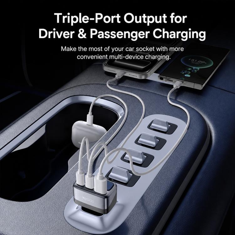 Triple-port car charger with cables charging multiple devices in a car