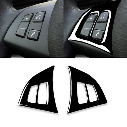 Steering wheel button sticker set, black with white border, on steering wheel buttons