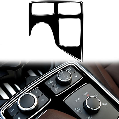Black multimedia panel trim sticker with silver outline, left-drive control dials