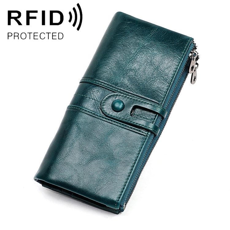 Teal leather folding RFID wallet with snap clasp and card slots