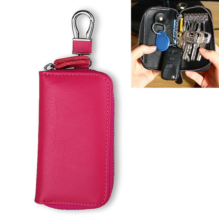 Magenta/red genuine leather zipper key pouch with metal key ring, front view