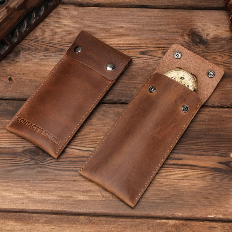 Multiple brown leather watch protective cases with snap tabs and open slots for watch
