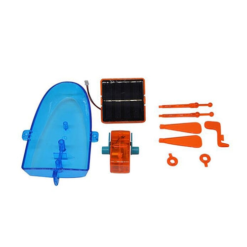 DIY solar-powered boat kit parts: blue hull, orange motor, black solar panel and tools