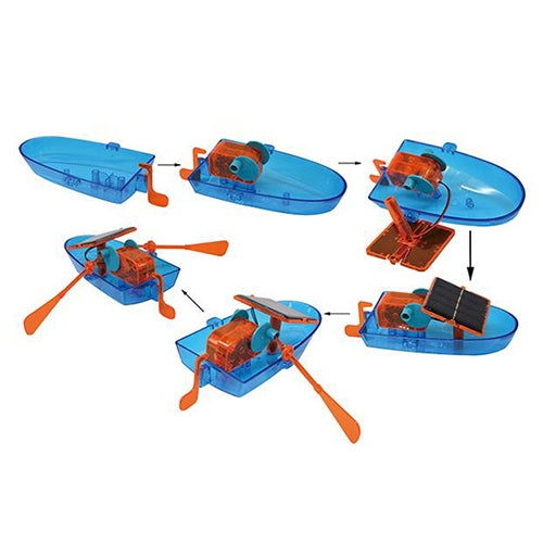 Solar-powered boat assembly layout showing parts and completed blue boat