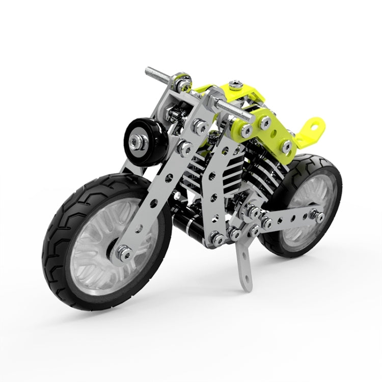 Side view of metal DIY motorcycle model with lime green frame and front wheel.