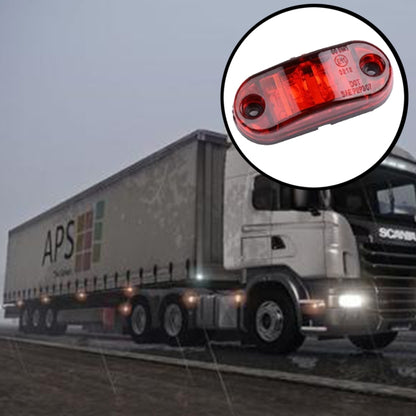 Red oval LED trailer side marker light, clear lens, two round mounting holes.