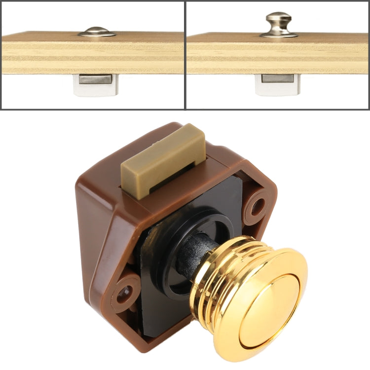 Press type cabinet latch with gold round release button and brown mounting housing