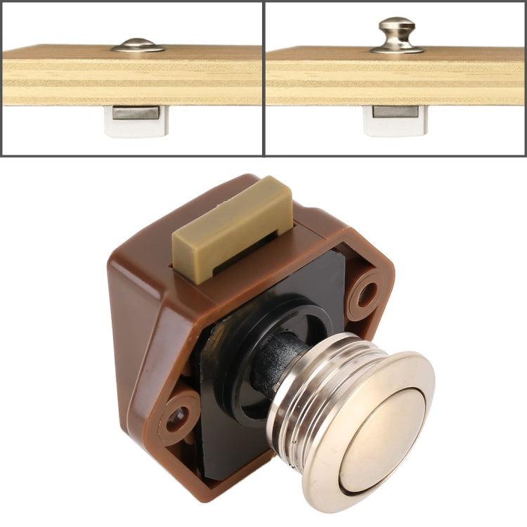 Brown press-to-release cabinet latch with black insert and round light knob
