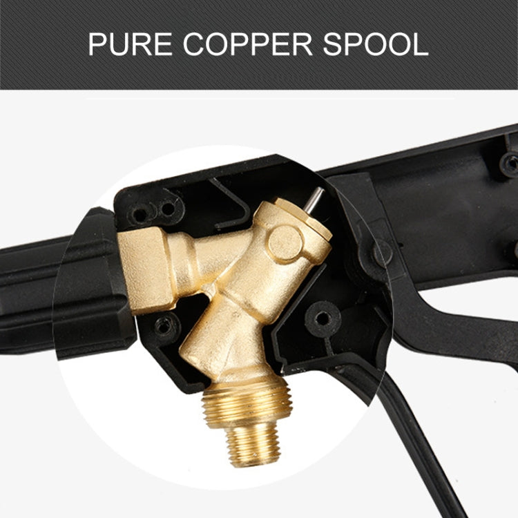 Close-up of black steam water gun head with brass valve fitting and threaded outlet