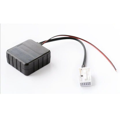 Car wireless Bluetooth module with AUX audio adapter cable, black box and white connector