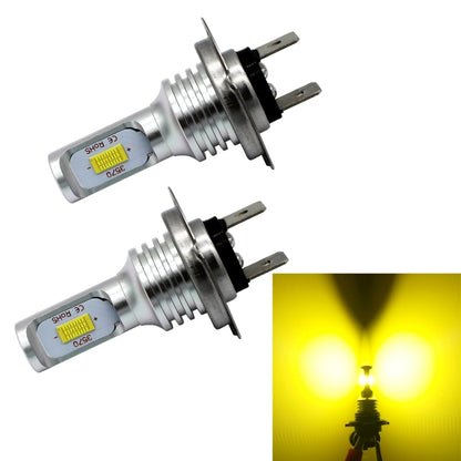 Pair of silver H7 LED fog light bulbs with side pins and heat-sink ridges
