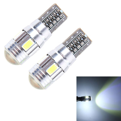 Pair of T10 LED car bulbs with silver housing, emitting bright white light (shown)