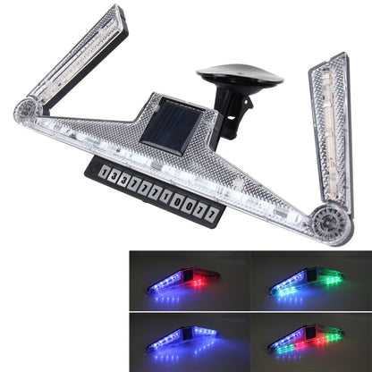 Foldable solar warning lamp with diamond-pattern clear lens and black mount, LED flashing