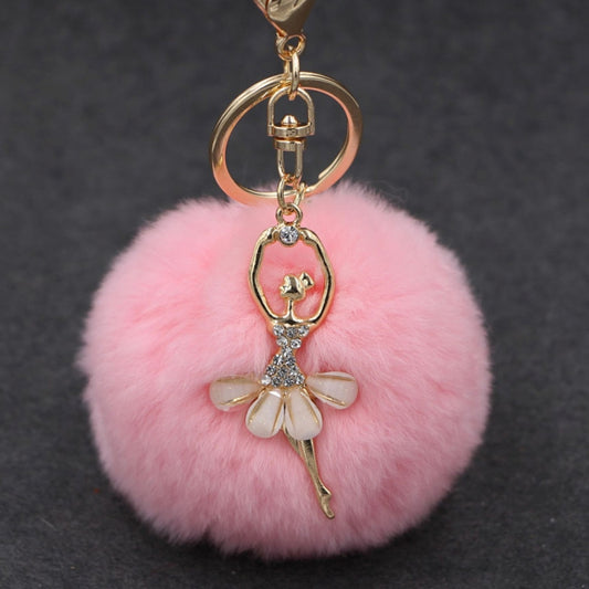 Pink fuzzy pom pom rabbit ballet keychain with gold ring and dangling butterfly charm