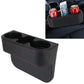 Black car seat crevice storage box with two cup holders and red-stitched trim
