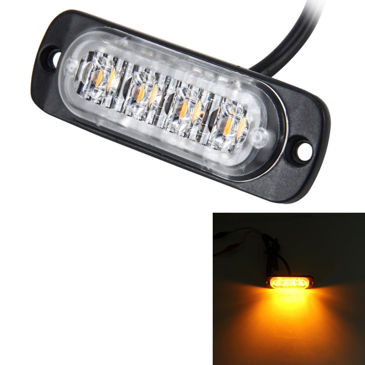 Amber-glowing LED strobe warning light with clear lens, 4 LEDs, and attached cable