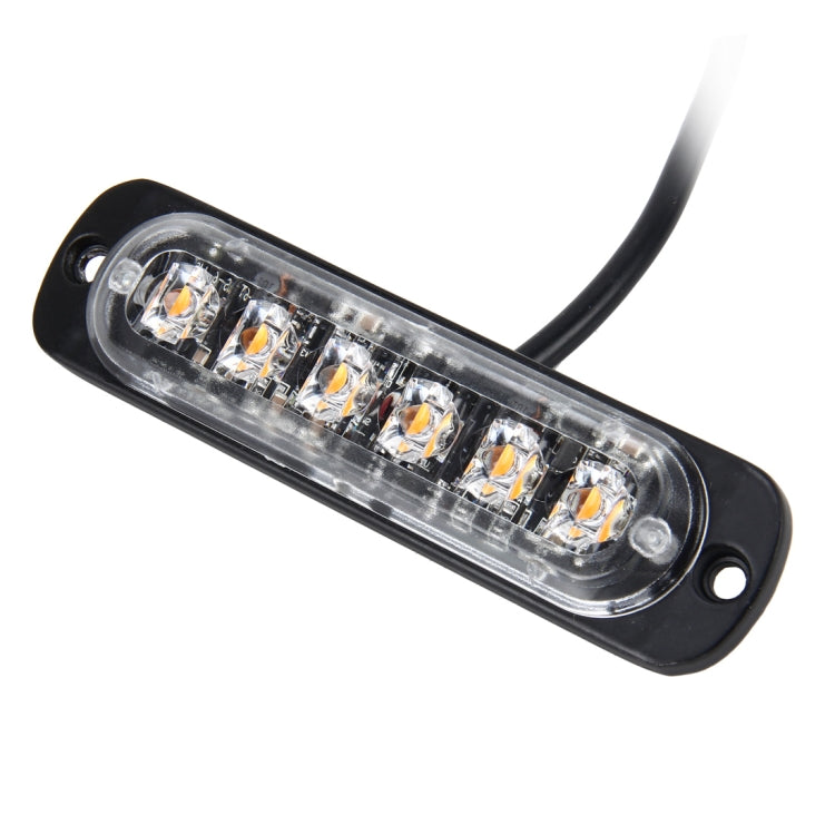 Amber LED strobe light bar with 6 LED segments, clear cover, black housing