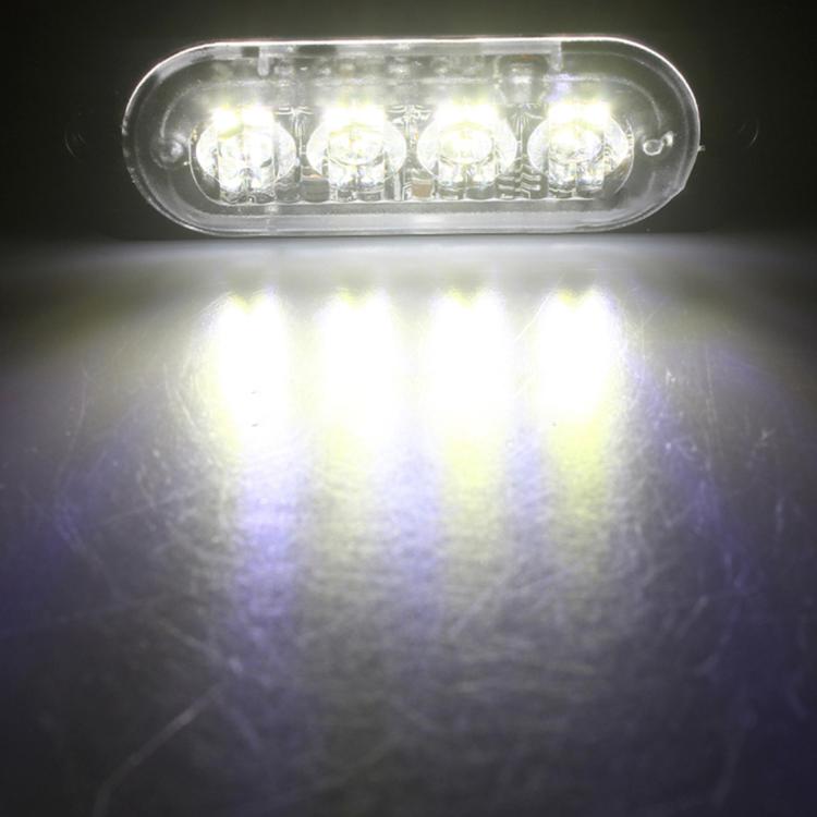 LED strobe warning light showing bright white illumination through clear oval lens