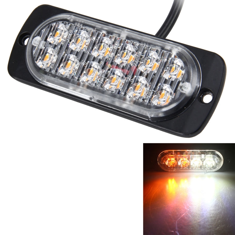 12-LED strobe warning light emitting amber light, black housing with clear lens.