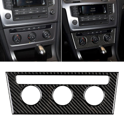 Carbon fiber air control rotary button trim sticker on car console with three round cutouts