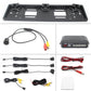 Black license plate camera frame kit with monitor unit, wiring harness, and cables