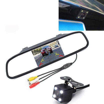 Rear view mirror monitor with connected rear camera and AV cables, black housing