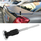Car-mounted magnetic antenna with red telescoping rod above a black base