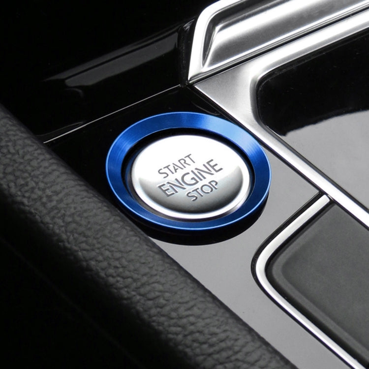 Blue push-start engine stop button ring with START ENGINE STOP lettering
