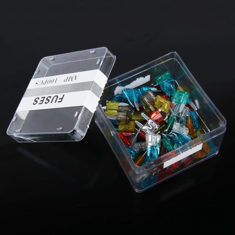 Medium blade fuse tap adapter beside clear box of multicolor blade fuses