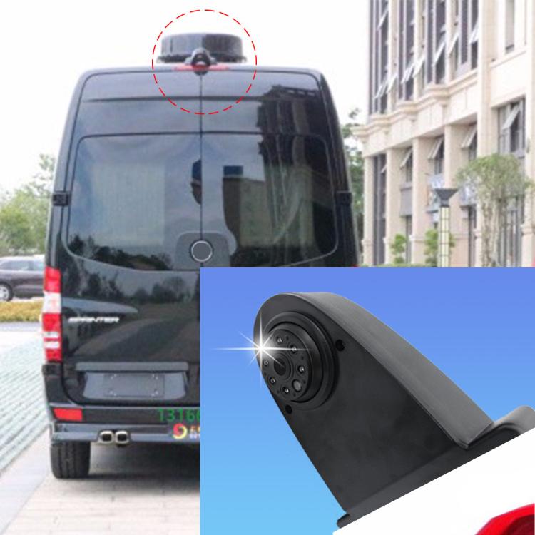 Reversing car camera with black housing and lens mounted on vehicle rear panel
