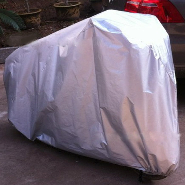 Lavender bicycle cover draped over motorcycle-style wheels