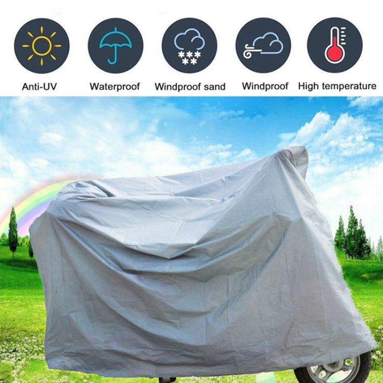 Light gray bicycle cover draped over motorcycle-style wheels