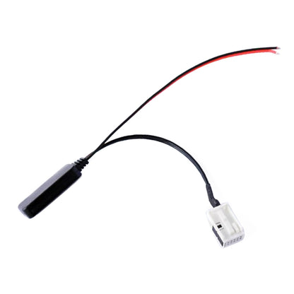 Car AUX Bluetooth audio wiring harness with inline black module and white connector plug