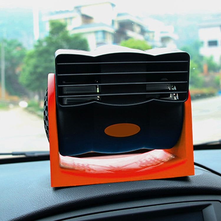 Portable vehicle cooling fan front view with vent grille and orange oval center panel