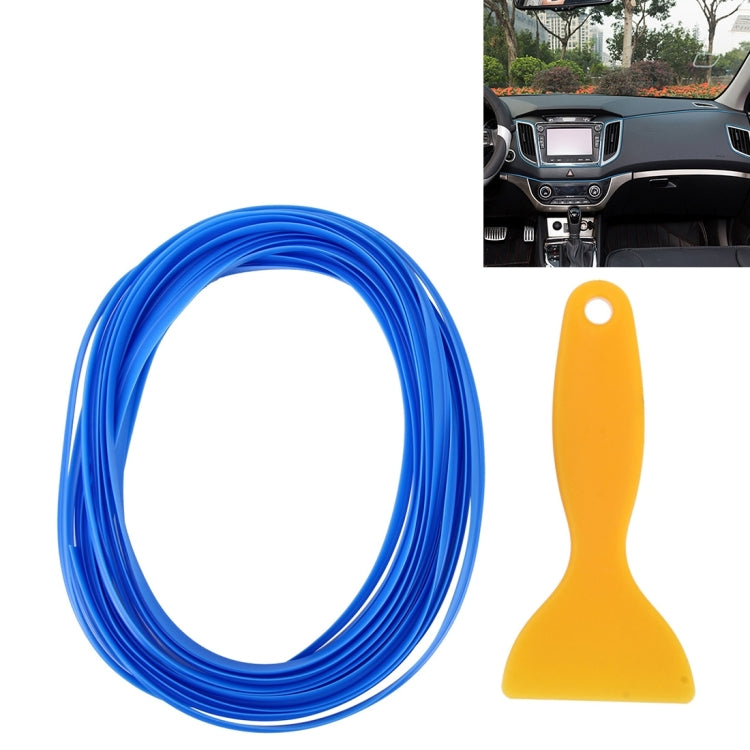 Blue flexible car interior trim strip coil with orange scraper tool